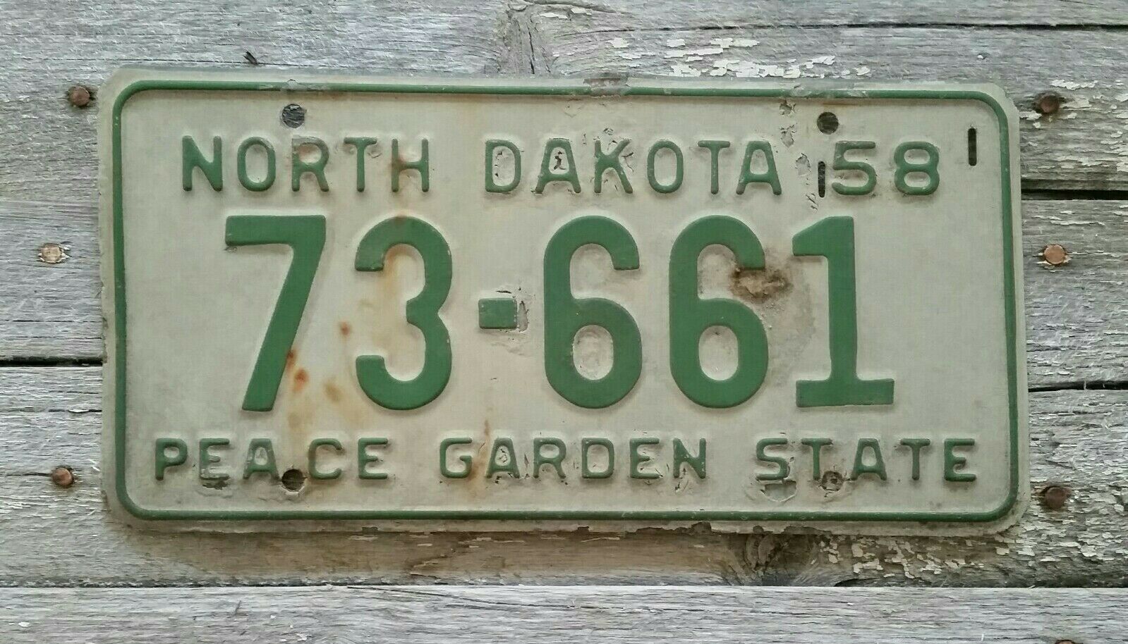 1958 # 73-661 North Dakota License Plate Peace Garden State, Green, Vintage